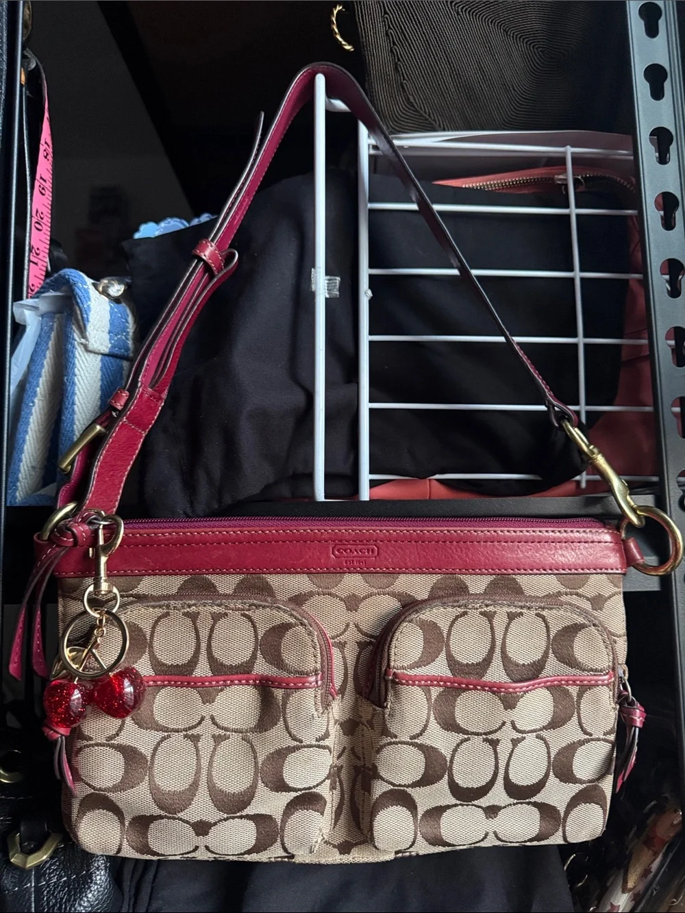 Coach Signature Canvas with red leather trim